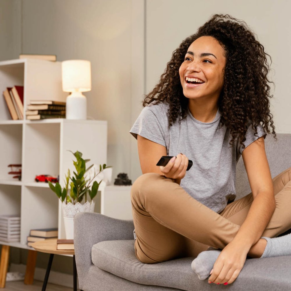 woman-couch-watching-tv (1)